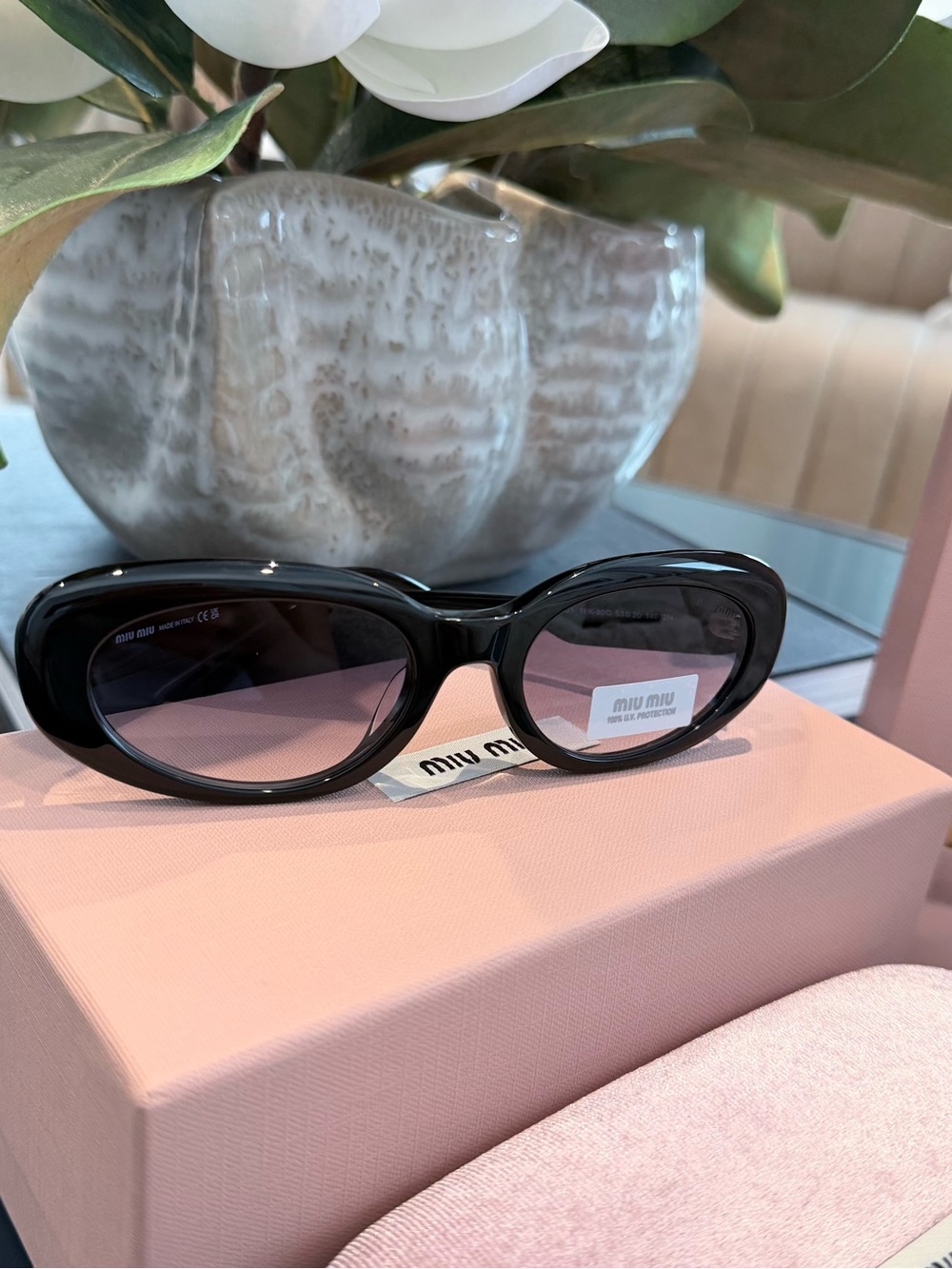 Miu Miu Glossy Black Frames with Soft Pink Gradient Lenses